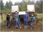 Some 6th graders from the brigada working on our composter.