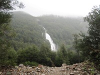 A temporary waterfall from days of rain and melting snow, along the Palena River