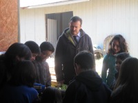 The children in the Brigada planting seedtrays in late winter.