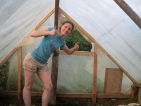 Me happy after building a window in the greenhouse.