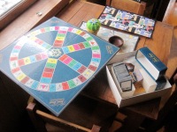 In the restaurant on the corner, I found a copy of Trivial Pursuit, an iconic trivia game from my childhood.